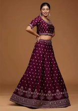 Women Embroidered Lehenga Choli with Dupatta